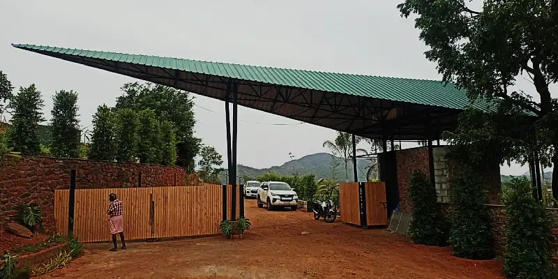 Grand Thatched Entrance and Lotus Lake